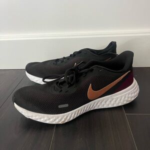 Black Nike Sneakers with Gold and Maroon